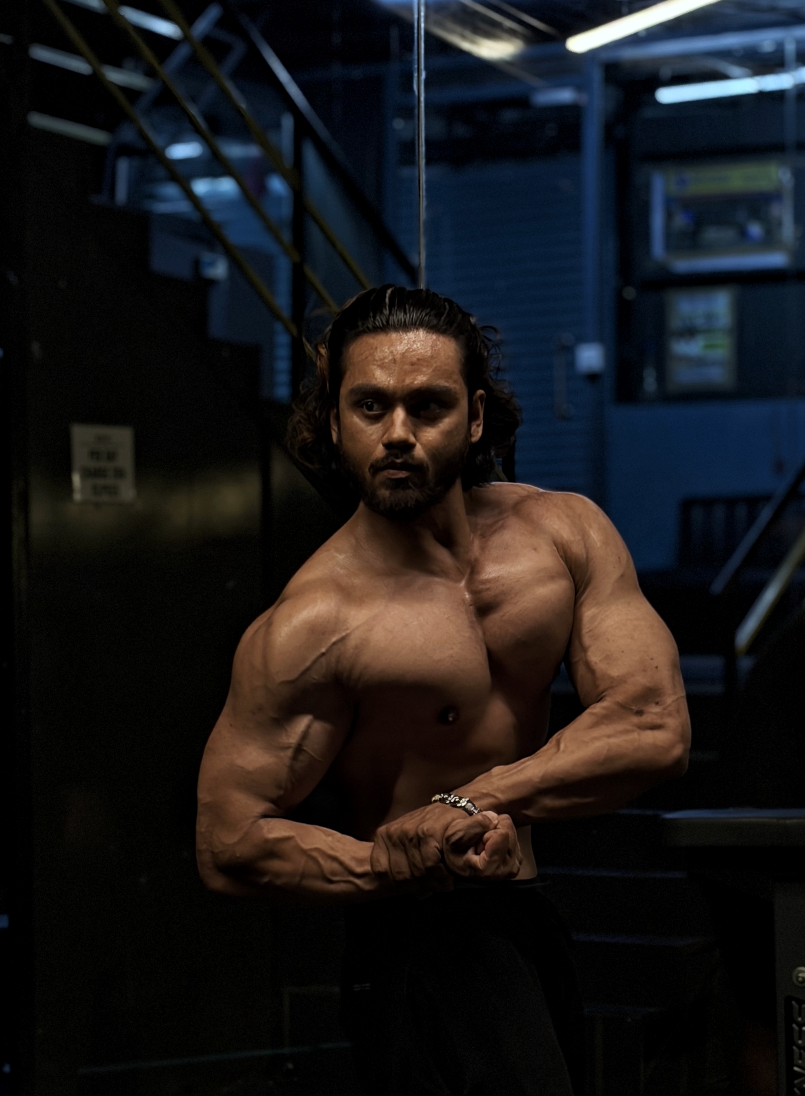 Abhishek in a dark editorial portrait